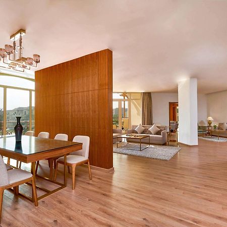 Moevenpick Hotel Cairo - Media City Giza Exterior photo A 3D rendering of a living room