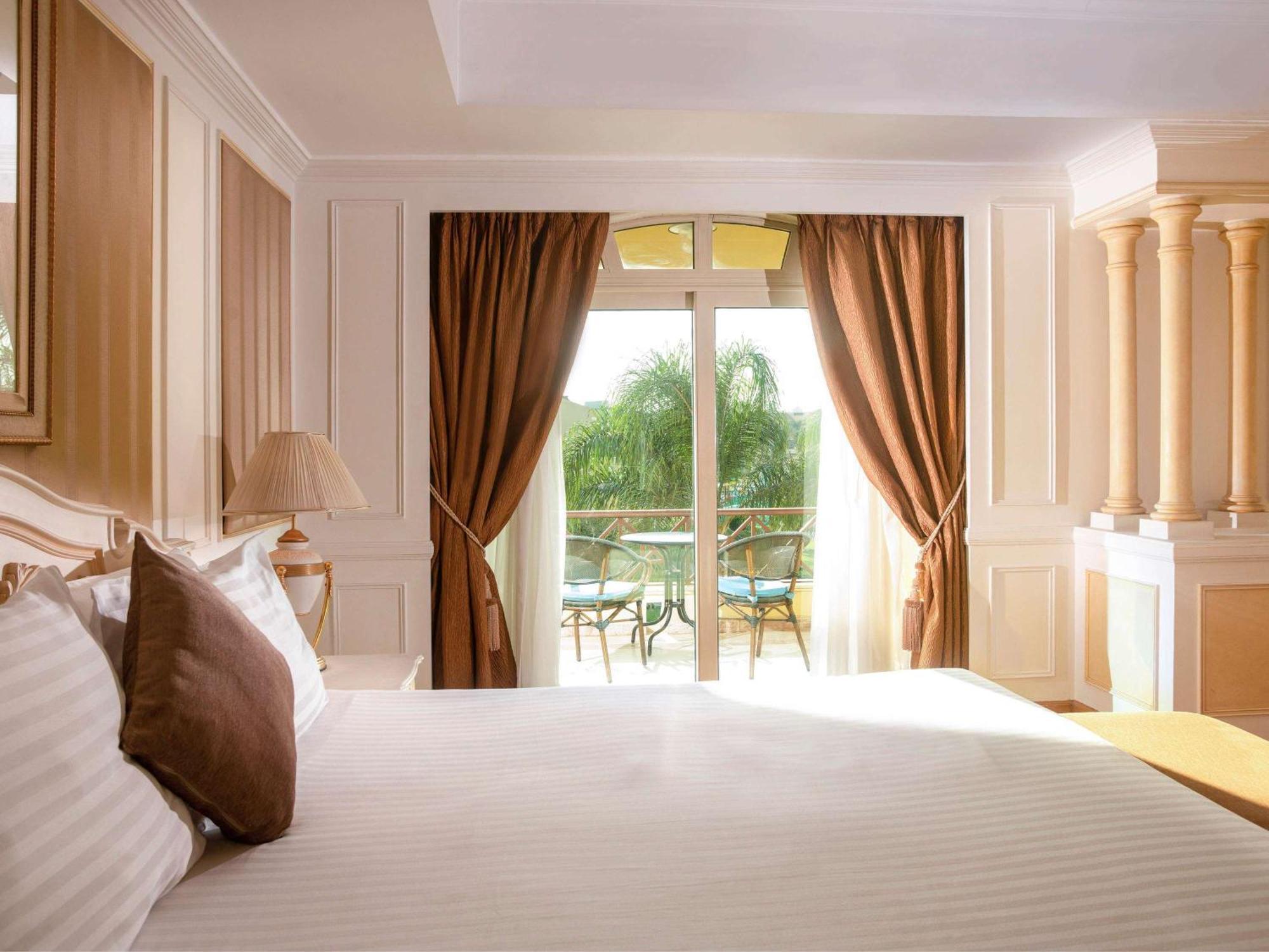 Moevenpick Hotel Cairo - Media City Giza Exterior photo A bedroom at the hotel