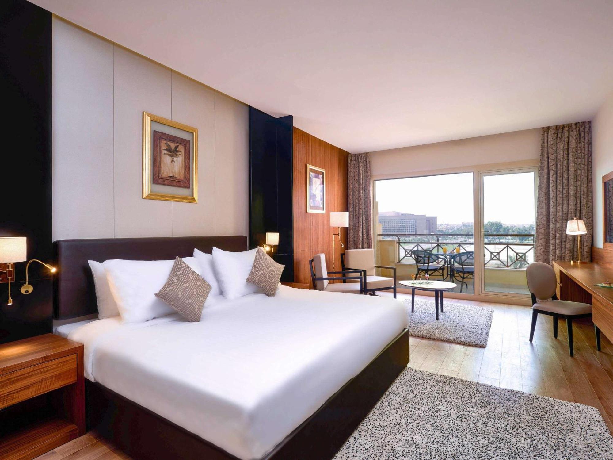 Moevenpick Hotel Cairo - Media City Giza Exterior photo A room at the hotel